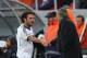 BUCHAREST, ROMANIA - OCTOBER 01: Juan Mata (L) of Chelsea shakes hands with manager Jose Mourinho (R) after being substituted during the UEFA Champions League Group E Match between FC Steaua Bucuresti and Chelsea at the National Arena Stadium on October 1