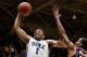 Nov 19, 2013; Durham, NC, USA; Duke Blue Devils forward Jabari Parker (1) goes up for the dunk past East Carolina Pirates guard Antonio Robinson (11) at Cameron Indoor Stadium. Mandatory Credit: Mark Dolejs-USA TODAY Sports