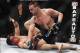 Feb 15, 2012; Omaha, NE, USA; Jake Ellenberger (top) fights with Diego Sanchez in the Main Event during UFC on Fuel TV 1 at Omaha Civic Auditorium. Mandatory Credit: Matt Ryerson-USA TODAY Sports