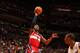 MIAMI, FL - NOVEMBER 3: John Wall #2 of the Washington Wizards shoots against the Miami Heat on November 3, 2013 at American Airlines Arena in Miami, Florida. NOTE TO USER: User expressly acknowledges and agrees that, by downloading and/or using this phot