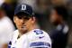 NEW ORLEANS, LA - NOVEMBER 10: Tony Romo #9 of the Dallas Cowboys stands on the sideline during a game against the New Orleans Saints at the Mercedes-Benz Superdome on November 10, 2013 in New Orleans, Louisiana. New Orlerans won the game 49-17. (Photo
