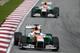 Di Resta leads Sutil at the 2013 Malaysian Grand Prix.