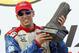 Justin Wilson celebrates on the podium at the 2013 Grand Prix of Houston.
