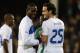 LONDON, ENGLAND - NOVEMBER 18: Mario Balotelli and Marco Parolo #25 of Italy smile during the international friendly match between Italy and Nigeria at Craven Cottage on November 18, 2013 in London, England. (Photo by Claudio Villa/Getty Images)