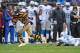 PITTSBURGH, PA - NOVEMBER 17 : Antonio Brown #84 of the Pittsburgh Steelers runs past a diving Chris Houston #23 of the Detroit Lions for a first quarter touchdown on November 17, 2013 at Heinz Field in Pittsburgh, Pennsylvania. (Photo by Joe Sargent/Ge