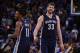 November 20, 2013; Oakland, CA, USA; Memphis Grizzlies point guard Mike Conley (11) and center Marc Gasol (33) celebrate after a basket during overtime against the Golden State Warriors at Oracle Arena. The Grizzlies defeated the Warriors 88-81 in overtim