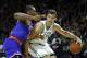 Oct 9, 2013; Providence, RI, USA; Boston Celtics power forward Kris Humphries (43) dribbles the ball against New York Knicks small forward Metta World Peace (left) during the second half at Dunkin Donuts Center. Mandatory Credit: Mark L. Baer-USA TODAY Sp