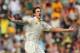 BRISBANE, AUSTRALIA - NOVEMBER 22: Mitchell Johnson of Australia celebrates after dismissing Joe Root of England during day two of the First Ashes Test match between Australia and England at The Gabba on November 22, 2013 in Brisbane, Australia. (Photo