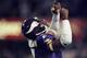 10 Jan 1999: Quarterback Randall Cunningham #7 of the Minnesota Vikings thanking god after scoring on a touch down pass during the NFC Play Offs Game against the Arizona Cardinals at the Hubert H. Humphrey Metrodome in Minneapolis, Minnesota. The Vikings