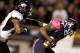 Nov 20, 2013; Toledo, OH, USA; Toledo Rockets wide receiver Bernard Reedy (1) makes a touchdown catch with Northern Illinois Huskies cornerback Marlon Moore (21) covering him during the third quarter at Glass Bowl. The Huskies beat the Rockets 35-17. Mand