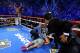 LAS VEGAS, NV - DECEMBER 08: Manny Pacquiao lays face down on the mat after being knocked out in the sixth round as Juan Manuel Marquez celebrates during their welterweight bout at the MGM Grand Garden Arena on December 8, 2012 in Las Vegas, Nevada. (Ph