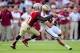 TALLAHASSEE, FL - OCTOBER 13: Bobby Swigert #10 of the Boston College Eagles is brought down by Lamarcus Joyner #20 of the Florida State Seminoles during a game at Doak Campbell Stadium on October 13, 2012 in Tallahassee, Florida. (Photo by Stacy Revere
