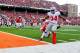 Nov 16, 2013; Champaign, IL, USA; Ohio State Buckeyes running back Carlos Hyde (34) scores a touchdown during the second quarter against the Ohio State Buckeyes at Memorial Stadium. Mandatory Credit: Bradley Leeb-USA TODAY Sports