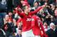 MANCHESTER, ENGLAND - JANUARY 13: Robin van Persie of Manchester United celebrates scoring the opening goal during the Barclays Premier League match between Manchester United and Liverpool at Old Trafford on January 13, 2013 in Manchester, England. (Pho