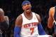 NEW YORK, NY - NOVEMBER 20: Carmelo Anthony #7 of the New York Knicks reacts after scoring a basket against the Indiana Pacers at Madison Square Garden on November 20, 2013 in New York City. NOTE TO USER: User expressly acknowledges and agrees that, by do