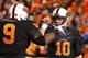 STILLWATER, OK - NOVEMBER 23: Kye Staley #9 and Clint Chelf #10 of the Oklahoma State Cowboys celebrate Staley's a first quarter touchdown against the Baylor Bears at Boone Pickens Stadium on November 23, 2013 in Stillwater, Oklahoma. (Photo by Ronald M