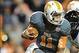 Nov 23, 2013; Knoxville, TN, USA; Tennessee Volunteers quarterback Joshua Dobbs (11) runs the ball against the Vanderbilt Commodores at Neyland Stadium. Vanderbilt won 14 to 10. Mandatory Credit: Randy Sartin-USA TODAY Sports