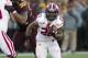 Nov 23, 2013; Minneapolis, MN, USA; Wisconsin Badgers running back James White (20) rushes with the ball in the first quarter against the Minnesota Golden Gophers at TCF Bank Stadium. Mandatory Credit: Jesse Johnson-USA TODAY Sports