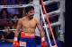 Jun. 9, 2012; Las Vegas, NV, USA; Manny Pacquiao smiles in the fourth round against Timothy Bradley Jr (not pictured) during a welterweight championship bout at the MGM Grand Garden Arena. Mandatory Credit: Mark J. Rebilas-USA TODAY Sports