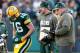 GREEN BAY, WI - NOVEMBER 10: Scott Tolzien #16 of the Green Bay Packers talks with Aaron Rodgers and head coach Mike McCarthy during a fourth quarter time out while playing the Philadelphia Eagles at Lambeau Field on November 10, 2013 in Green Bay, Wiscon