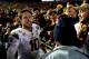 PASADENA, CA - NOVEMBER 23: Taylor Kelly #10 of the Arizona State Sun Devils celebrates a 38-33 win over the UCLA Bruins with fans in the endzone at Rose Bowl on November 23, 2013 in Pasadena, California. (Photo by Harry How/Getty Images)