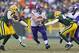 Nov 24, 2013; Green Bay, WI, USA; Minnesota Vikings running back Toby Gerhart (32) rushes with the football during overtime against the Green Bay Packers at Lambeau Field. The Vikings and Packers tied 26-26. Mandatory Credit: Jeff Hanisch-USA TODAY Spor