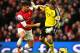 LONDON, ENGLAND - NOVEMBER 23: Goalkeeper Artur Boruc of Southampton loses the ball to Olivier Giroud of Arsenal leading to the opening goal during the Barclays Premier League match between Arsenal and Southampton at Emirates Stadium on November 23, 2013