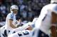Nov 24, 2013; Oakland, CA, USA; Tennessee Titans quarterback Ryan Fitzpatrick (4) stands behind center before taking a snap against the Oakland Raiders in the first quarter at O.co Coliseum. Mandatory Credit: Cary Edmondson-USA TODAY Sports