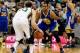 Nov 18, 2013; Salt Lake City, UT, USA; Utah Jazz shooting guard Gordon Hayward (20) dribbles the ball as Golden State Warriors small forward Andre Iguodala (9) defends during the second quarter at EnergySolutions Arena. Mandatory Credit: Chris Nicoll-USA