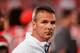 COLUMBUS, OH - SEPTEMBER 28: Head Coach Urban Meyer of the Ohio State Buckeyes watches his team warm up before a game against the Wisconsin Badgers at Ohio Stadium on September 28, 2013 in Columbus, Ohio. (Photo by Jamie Sabau/Getty Images)
