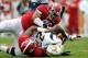TUSCALOOSA, AL - NOVEMBER 23: Brandon Ivory #99 and Jonathan Allen #93 of the Alabama Crimson Tide tackle Kendrix Huitt #27 of the Chattanooga Mocs at Bryant-Denny Stadium on November 23, 2013 in Tuscaloosa, Alabama. (Photo by Kevin C. Cox/Getty Images)