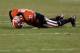 ATHENS, GA - NOVEMBER 23: Quarterback Aaron Murray #11 of the Georgia Bulldogs lays on the ground after getting injured during the game against the Kentucky Wildcats at Sanford Stadium on November 23, 2013 in Athens, Georgia. (Photo by Mike Zarrilli/Get