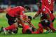 CARDIFF, WALES - NOVEMBER 24: Kim Bo-Kyung (floor) of Cardiff celebrates with team mates after heading in the second Cardiff goal during the Barclays Premier League match between Cardiff City and Manchester United at Cardiff City Stadium on November 24,