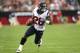GLENDALE, AZ - NOVEMBER 10: Running back Dennis Johnson #28 of the Houston Texans carries the ball against the Arizona Cardinals at University of Phoenix Stadium on November 10, 2013 in Glendale, Arizona. (Photo by Stephen Dunn/Getty Images)