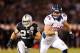 OAKLAND, CA - DECEMBER 06: Jacob Tamme #84 of the Denver Broncos runs with the ball against Matt Giordano #27 of the Oakland Raiders at Oakland-Alameda County Coliseum on December 6, 2012 in Oakland, California. (Photo by Ezra Shaw/Getty Images)
