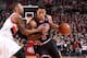 PORTLAND, OR - NOVEMBER 22: Derrick Rose #1 of the Chicago Bulls drives to the basket against Damian Lillard #0 of the Portland Trail Blazers on November 22, 2013 at the Moda Center Arena in Portland, Oregon. NOTE TO USER: User expressly acknowledges and