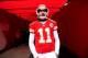 KANSAS CITY, MO - NOVEMBER 24: Quarterback Alex Smith #11 of the Kansas City Chiefs waits to be introduced prior to the game against the San Diego Chargers at Arrowhead Stadium on November 24, 2013 in Kansas City, Missouri. (Photo by Jamie Squire/Getty