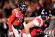 OXFORD, MS - NOVEMBER 23: Bo Wallace #14 of the Ole Miss Rebels calls a play at the line of scrimmage during a game against the Missouri Tigers at Vaught-Hemingway Stadium on November 23, 2013 in Oxford, Mississippi. Missouri won the game 24-10. (Photo