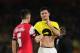 LONDON, ENGLAND - OCTOBER 22: A dejected Laurent Koscielny shakes hands with Olivier Giroud of Arsenal at the final whistle during the UEFA Champions League Group F match between Arsenal and Borussia Dortmund at Emirates Stadium on October 22, 2013 in L