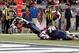 Nov 24, 2013; St. Louis, MO, USA; St. Louis Rams running back Benny Cunningham (36) dives to score a touchdown during the fourth quarter against the Chicago Bears at the Edward Jones Dome. Mandatory Credit: Scott Kane-USA TODAY Sports