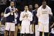 Nov 11, 2013; Indianapolis, IN, USA; Indiana Pacers from left to right forward David West, guard George Hill, guard Lance Stephenson, forward Paul George, and center Roy Hibbert watch the Pacers extend their winning streak to 8-0 against the Memphis Grizz