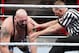 A referee comes to Big Show's aid Monday night.