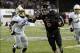 Nov 26, 2013; DeKalb, IL, USA; Northern Illinois Huskies quarterback Jordan Lynch (6) rushes for a touchdown against Western Michigan Broncos cornerback Ronald Zamort (7) during the second quarter at Huskie Stadium. Mandatory Credit: Mike DiNovo-USA TODAY