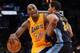LOS ANGELES, CA - MAY 12: Kobe Bryant #24 of the Los Angeles Lakers drives on Andre Miller #24 of the Denver Nuggets in the third quarter in Game Seven of the Western Conference Quarterfinals in the 2012 NBA Playoffs on May 12, 2012 at Staples Center in