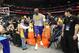 SHANGHAI, CHINA - OCTOBER 18: Kobe Bryant #24 of the Los Angeles Lakers shakes hands with a fan against the Golden State Warriors during the 2013 Global Games on October 18, 2013 at the Mercedes-Benz Arena in Shanghai, China. NOTE TO USER: User expressly