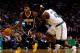 BOSTON, MA - NOVEMBER 22: Paul George #24 of the Indiana Pacers drives to the basket against Gerald Wallace #45 of the Boston Celtics during a game at the TD Garden on November 22, 2013 in Boston, Massachusetts. NOTE TO USER: User expressly acknowledges a