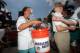 Terry Saban (left), interacting with Dolphins fans in 2005.