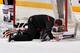 NASHVILLE, TN - NOVEMBER 16: Goalie Nikolai Khabibulin #39 of the Chicago Blackhawks is examined by medical staff after being injured in a game against the Nashville Predators at Bridgestone Arena on November 16, 2013 in Nashville, Tennessee. (Photo by