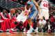 CHICAGO, IL - OCTOBER 25: Luol Deng #9 of the Chicago Bulls drives to the basket against the Denver Nuggets on October 25, 2013 at the United Center in Chicago, Illinois. NOTE TO USER: User expressly acknowledges and agrees that, by downloading and/or us