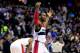 WASHINGTON, DC - NOVEMBER 26: John Wall #2 of the Washington Wizards celebrates during the closing seconds of their 116-111 win over the Los Angeles Lakers at Verizon Center on November 26, 2013 in Washington, DC. NOTE TO USER: User expressly acknowledges